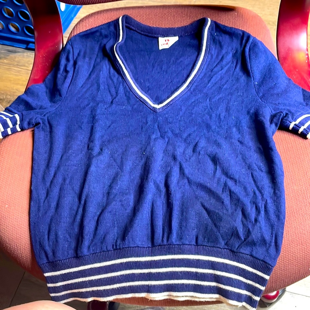 Vintage child, size large, navy blue top with white detail, the red eye brand